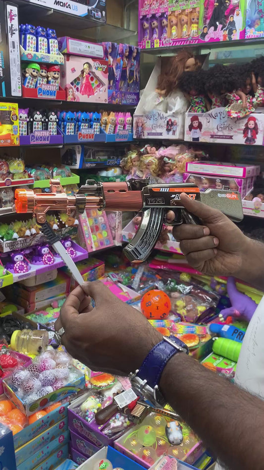 West Cowboy AK47 Toy Gun with Lights Sound and Smoke Rotating for Kids